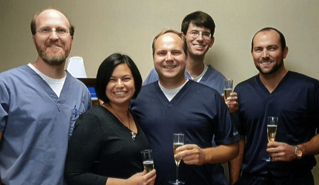 Dr. John Poczatek and partners 